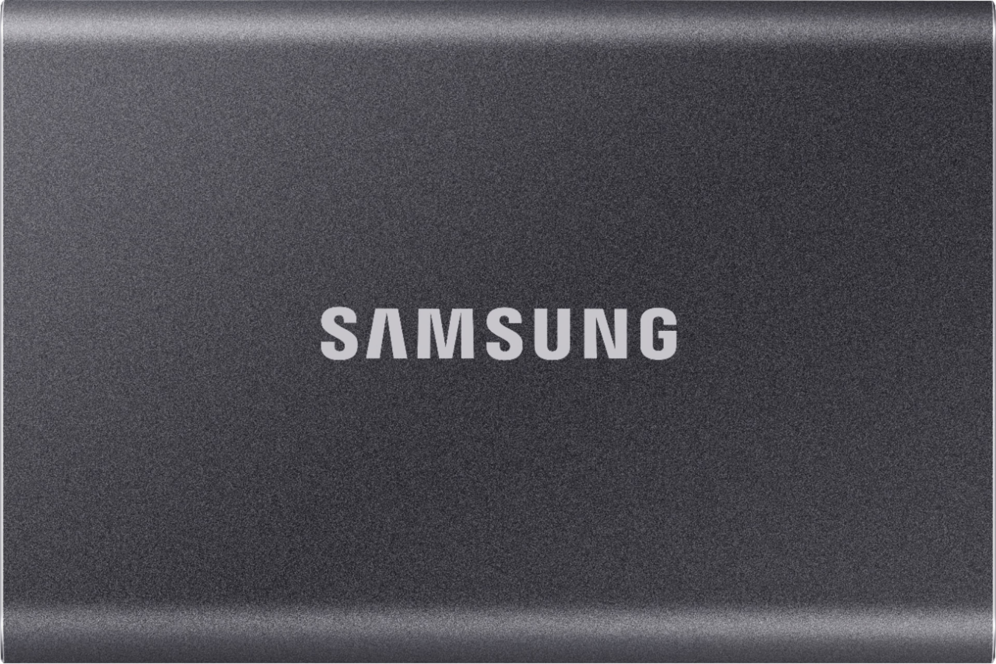 Samsung T7 Portable SSD connected to a laptop showing fast data transfer
