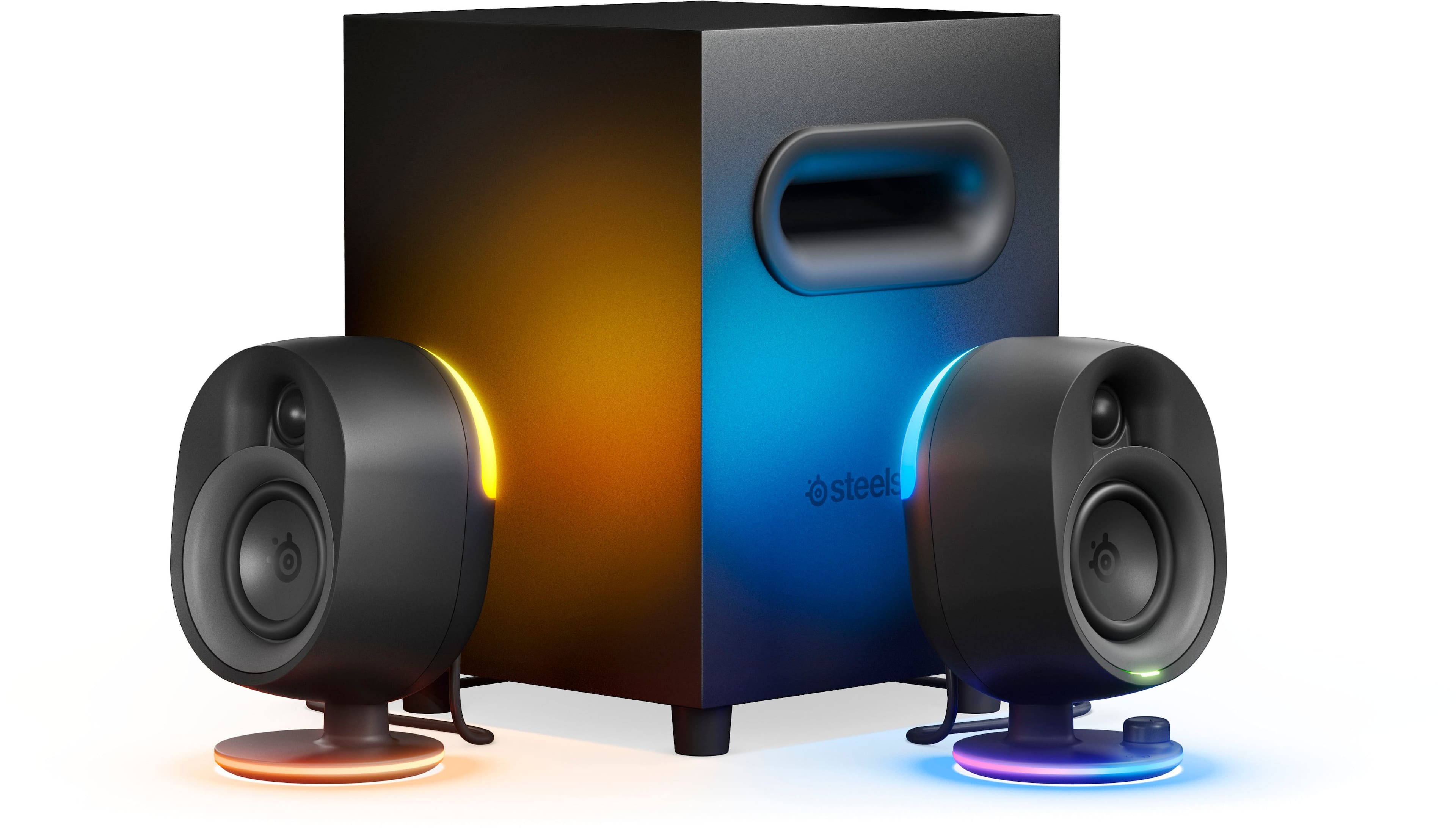 SteelSeries Arena 7 Gaming Speakers setup with RGB lighting on a gaming desk